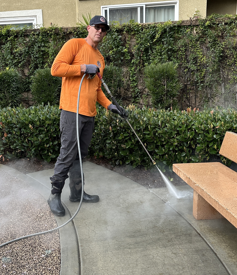 Derek Kinnison pressure washing residential patio