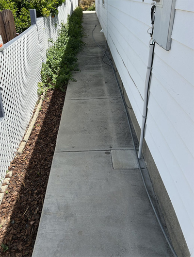 Concrete pathway cleaning